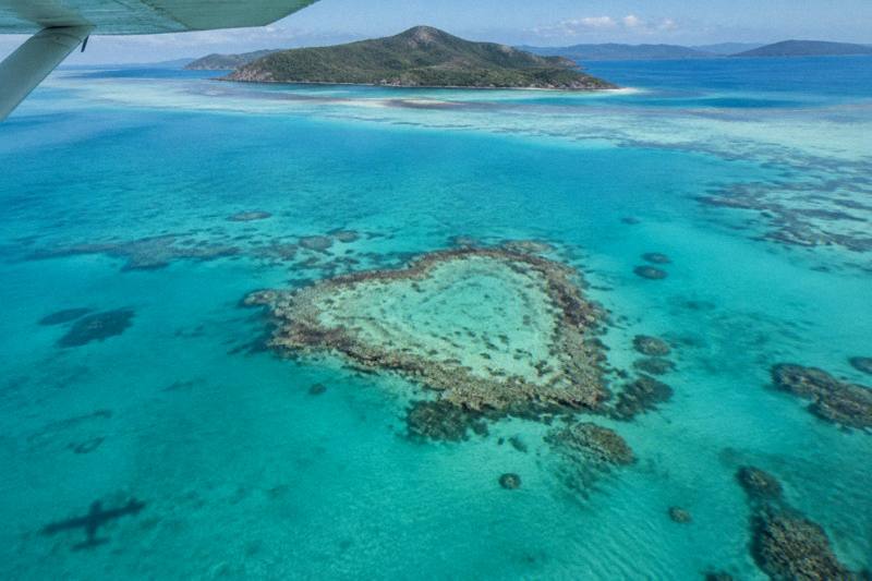A small plane's view of Heart Reef in the Great Barrier Reef
